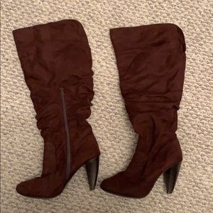 Brown heeled below the knee boots
